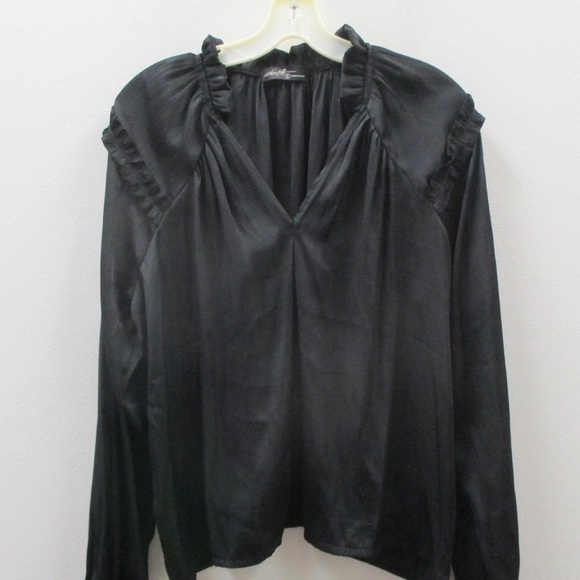 Beautiful black silky peasant blouse. Cute ruffle detail on top with neck tie. - Picture 7 of 7